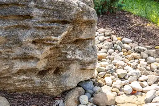 Firepit with boulders around the perimeter